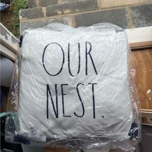 1 Rae Dunn White 'Our Nest' Pillow still in plastic